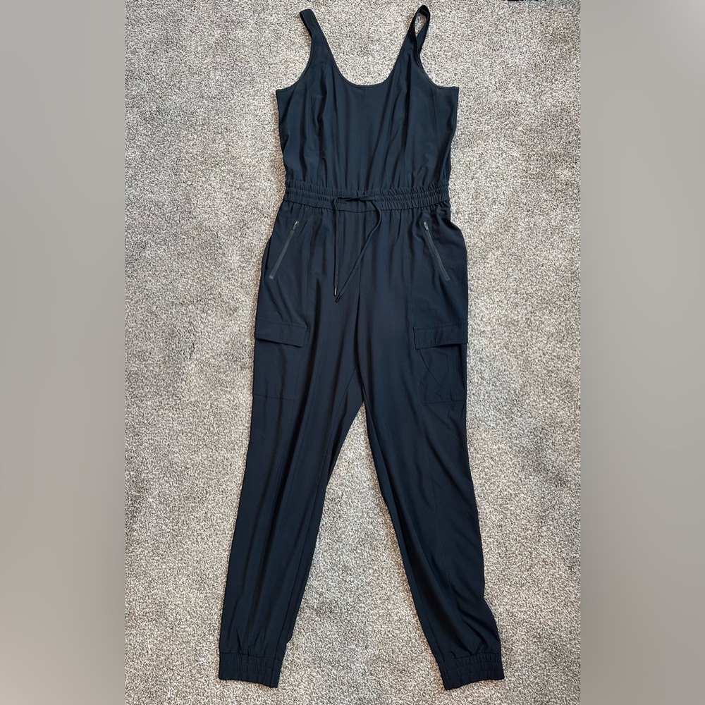 Athleta Unbound Black Jumpsuit Jogger Sleeveless pull on Tie Waist M TALL EUC